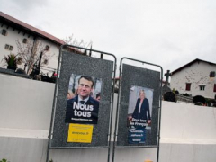 Macron, Le Pen square off for definitive argument as vote looms