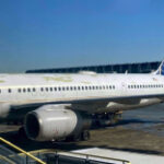 United Airlines Jet Looks Worse for Wear on Paint Shop Back-Up