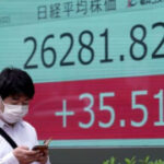 Asian shares primarily lower inspiteof Wall St rally; eyes on Fed