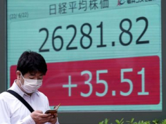 Asian shares primarily lower inspiteof Wall St rally; eyes on Fed