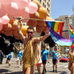 Pride Revelers Celebrate Love as Threats to LGBTQ Rights Hover