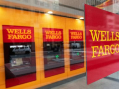 Wells Fargo revenue falls buy loan development buoys financiers