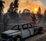 California fire teams sluggish development of blaze near Yosemite, thousands still under evacuation orders