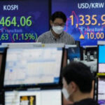 Asian stocks combined priorto Fed conference after China cuts rate