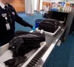 Summertime reward program triggering airport screening personnel to work while ill, unions state
