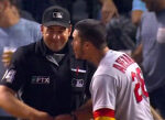 MLB fans crushed this ump for smiling after ejecting Nolan Arenado following an horrible call
