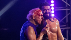 Ric Flair states bye-bye in fitting style, with a snazzy bathrobe and a bloody face | Opinion