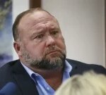 Conspiracy theorist Alex Jones yields Sandy Hook shooting ‘100% genuine’ at disparagement trial