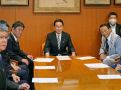 Japan PM purges Cabinet after assistance falls over church ties