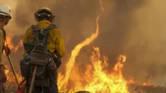 Coastal storm cools California heat wave, moistens southern wildfire