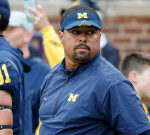 Michigan coach Mike Hart hauled off the field after sideline collapse
