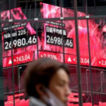Asian shares fall after weak revenues pull Wall St lower