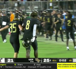 2 UCF gamers wonderfully avoided off the field holding hands after pounding Cincinnati