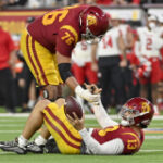 Social Media Buzz: Oregon Duck fans giant USC Trojans after impressive collapse in Pac-12 Championship