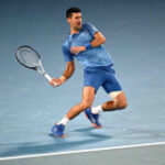 Djokovic fights into Australian Open last 16