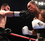 Unbeaten light-heavyweight world boxing champ Artur Beterbiev stops Britain’s Anthony Yarde in a thriller in London