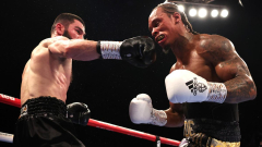 Unbeaten light-heavyweight world boxing champ Artur Beterbiev stops Britain’s Anthony Yarde in a thriller in London