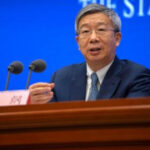 Preferring connection, China reappoints main bank guv