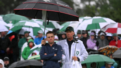 12 best photos from the Masters’ rain-soaked third round