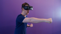 Why do some individuals get motion-sick playing VR videogames?