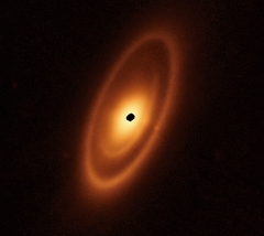 The warm dust around a close-by young star, Fomalhaut