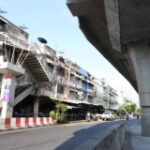 Bangkok guv surprises overpass employees with hurry-up see