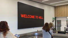 Hobart Airport’s choice to eliminate Dark Mofo’s ‘Welcome to hell’ indication an ‘overreaction’