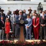 Eric Bieniemy signsupwith the Chiefs at White House to commemorate Super Bowl win