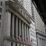 Stock market today: Wall Street wanders through a peaceful day to surface blended