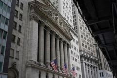 Stock market today: Wall Street wanders through a peaceful day to surface blended