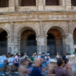 Italian authorities state the guy shot sculpting his name on the Colosseum is a traveler living in Britain