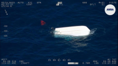 Team winched to security after boat capsizes off WA coast