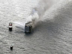 A truck bring almost 3,000 vehicles captures fire in the North Sea and a team member is eliminated