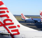 3 guys gottenridof from Virgin Australia flight by AFP at Darwin airport