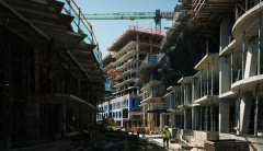 Clark tops out veryfirst of 3 towers at Washington, DC, apartmentorcondo task