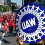 Car employees vote extremely to let union leaders call strikes versus business