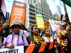 10s of thousands march to kick off environment top, requiring end to warming-causing fossil fuels