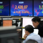 Stock market today: Asian shares increase, buoyed by Wall Street rally from bonds and oil rates