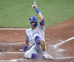 MLB playoffs: Rangers take 2-0 lead on Orioles; Twins tie series with Astros
