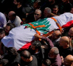 Funeral held for Reuters reporter eliminated in shelling, Lebanon filing UN problem as Israel examines