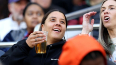 Fans go wild after finding Matildas superstar Sam Kerr in the crowd drinking a beer