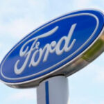 Ford profits fall brief of approximates after it strikes a tentative offer with the United Auto Workers