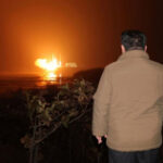 Kim Jong Un checks satellite pictures of “major target areas”