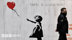 Banksy: Street artist validates veryfirst name in lost BBC interview
