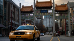 Yes, that’s a yellow New York City taxi travelling around Vancouver — satisfy the chauffeur