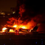 Fire damages Airbus jet after crash in Tokyo