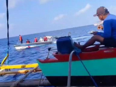 Filipino angler to China’s coast guard on contested shoal: `This is Philippine area. Go away’