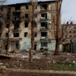 Ukraine soldiers withdraw from besieged town