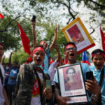Myanmar generals sentenced to death as 2 die in passport line