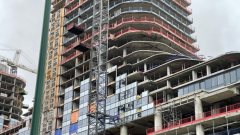 1 dead after crane load falls onto structure at Oakridge redevelopment website in Vancouver